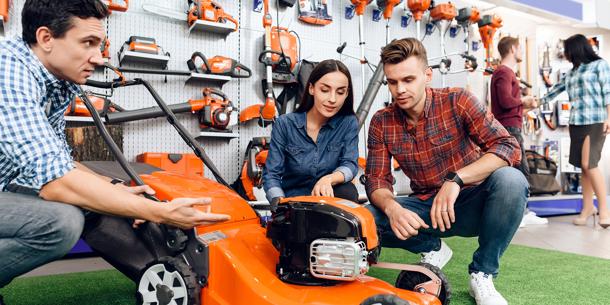 Couple shopping for a mower